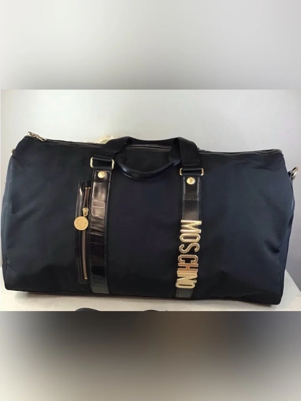 Moschino Black Duffel Bag with Gold Logo Hardware